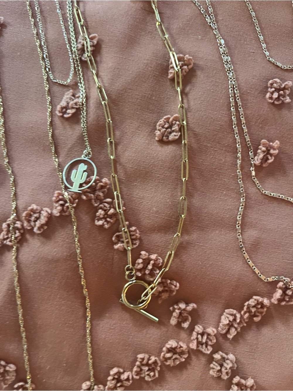Various gold-plated necklaces. Some are the “tarnish free”.
